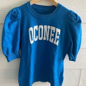 Oconee County High School blue sweater with elbow length puffed sleeves. Size S.
